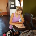 Blaire writing down her feedback